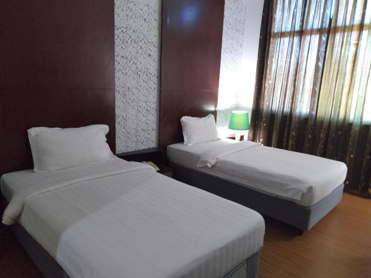 Ginasuite Kompleks27 Hotel บันดาร์เสรีเบกาวัน ภายนอก รูปภาพ