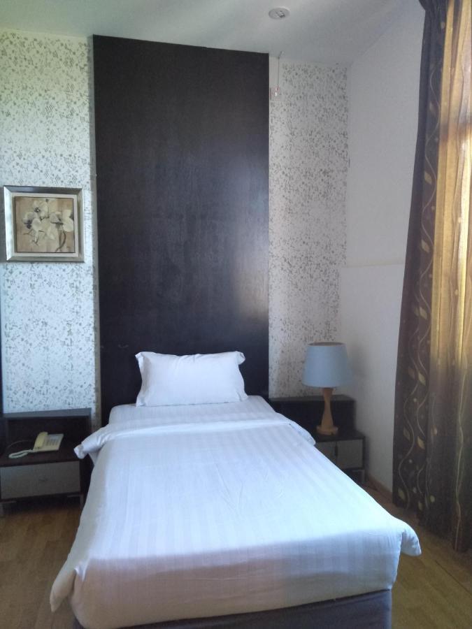 Ginasuite Kompleks27 Hotel บันดาร์เสรีเบกาวัน ภายนอก รูปภาพ
