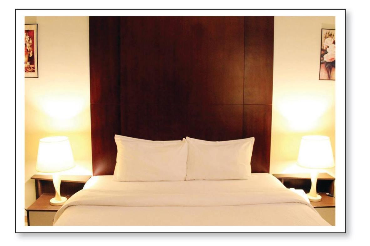Ginasuite Kompleks27 Hotel บันดาร์เสรีเบกาวัน ภายนอก รูปภาพ