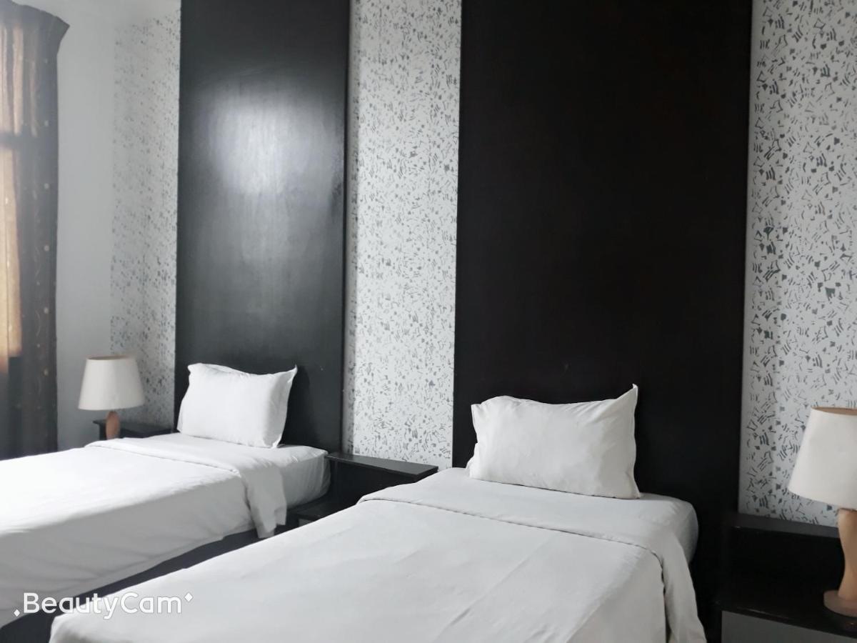 Ginasuite Kompleks27 Hotel บันดาร์เสรีเบกาวัน ภายนอก รูปภาพ