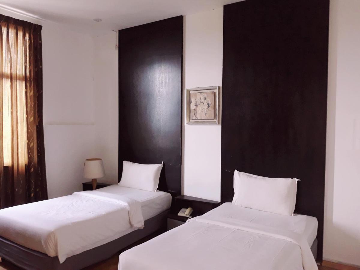 Ginasuite Kompleks27 Hotel บันดาร์เสรีเบกาวัน ภายนอก รูปภาพ
